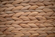 Closeup horizontally of woven rattan interwirl together