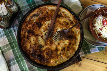 Traditional Serbian pie - layered pita rednica stuffed with cheese and baked in a special pot sac