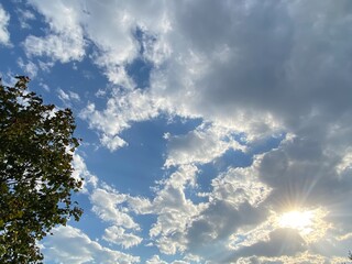 blue sky with clouds, sun landscape