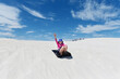 © Rafael Ben-Ari - Young girl  sliding down on Lancelin sand dunes Western Australi