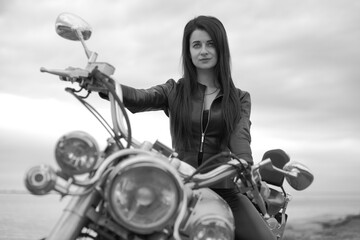 girl in black with a motorcycle