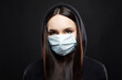 © eugenepartyzan - Girl in medicine Mask and Hoodie