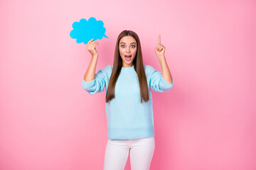 Poster - Excellent Photo of pretty crazy lady hold paper mind cloud raise finger have creative clever idea wear knitted blue pullover white trousers isolated pastel pink color background