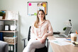 © AntonioDiaz - Pretty woman working in an office
