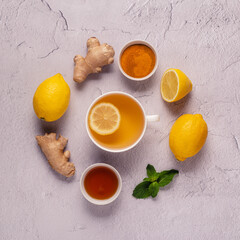 Wall Mural - Green tea with lemon and honey, Immunity boosting and cold remedies.