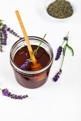 Wall Mural - Lavender Herbal Honey with Lavender Flowers. Selective focus.