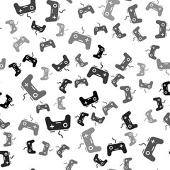 Black Gamepad icon isolated seamless pattern on white background. Game controller. Vector.