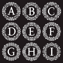 Wall Mural - Vintage monograms set of letters from A to I in round patterned frames. Isolated elements for logo design.