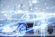 © peshkova - Desktop computer background in office with automobile hologram drawing. Multi exposure. Tech concept.