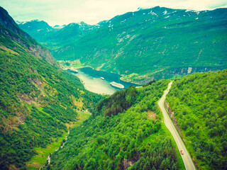 Wall Mural - Fjord Geirangerfjord with ferry boat, Norway.