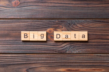 Wall Mural - big data word written on wood block. big data text on table, concept