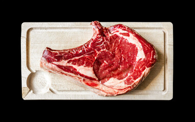 Wall Mural - Beef prime rib on a cutting board