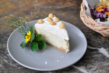 Wall Mural - coconut cake with cream and macadamia