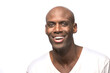 © SuperStock - Portrait of young bald African American man looking at camera smiling