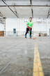 © victor espadas gonzalez/Westend61 - Surface level view of boy practicing roller hockey at court