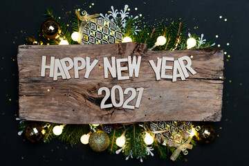 Wall Mural - happy new year 2021. symbol from number 2021 on wooden background