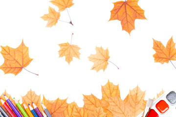 Wall Mural - colored pencils and paints decorated with autumn leaves. education and stationery conceptual. creative frame border