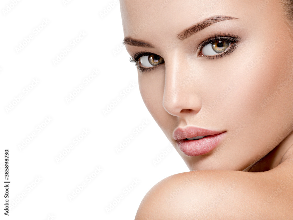 Beautiful face of young woman with perfect health fresh skin - obrazy, fototapety, plakaty 