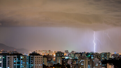 Images of the arrival of a strong summer storm with lightning and rain. Event in the city in the late afternoon, early evening in Niterói, Rio de Janeiro, Brazil