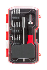 a set of working tools with a screwdriver and bits for repair in an label transparent plastic box with iron nozzles, an object isolated on a white background front view.