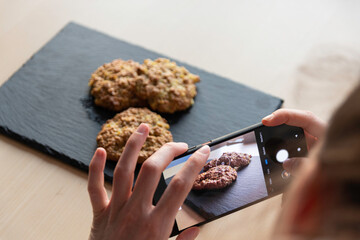 delicious homemade oatmeal cookies healthy food, laid out on a slate cutting board