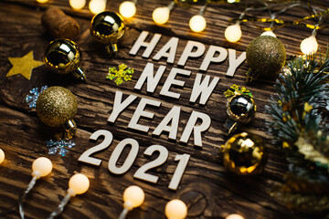 Wall Mural - symbol from number 2021 on wooden background. happy new year 2021.
