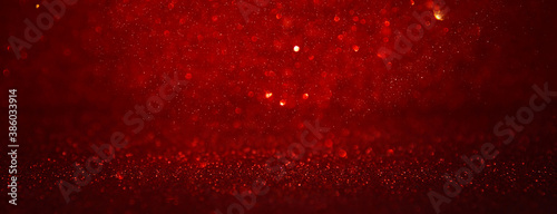 Fotografía background of abstract red, gold and black glitter lights