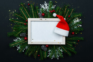 Wall Mural - christmas frame mockup for greeting cards on a black background.