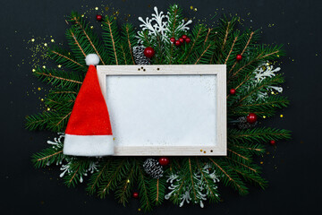 Wall Mural - christmas frame mockup for greeting cards on a black background.
