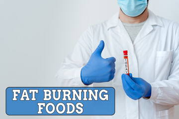 Word writing text Fat Burning Foods. Business photo showcasing produce fat loss by stimulating metabolism to reduce appetite Laboratory Blood Test Sample Shown For Medical Diagnostic Analysis Result