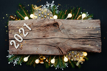 Wall Mural - symbol from number 2021 on wooden background. happy new year 2021.