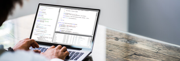Software Developer Writing Computer Code