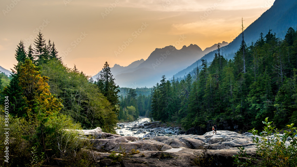 Sunset over the Kennedy River at the Pacific Rim National Park on the West Coast of Vancouver Island, British Columbia, Canada - obrazy, fototapety, plakaty 