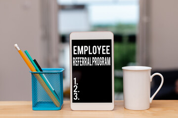 Poster - Handwriting text Employee Referral Program. Conceptual photo employees are rewarded for introducing recruits Paper accesories with digital smartphone arranged on different background