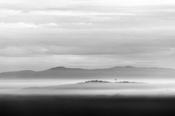 Sea of fog and mist between mountains and hills