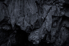 Black Rock Texture. Stone Background. Old Weathered Mountain Surface. Macro. Dark  Grunge Background.