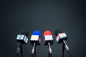 Set of microphones ready for the press conference