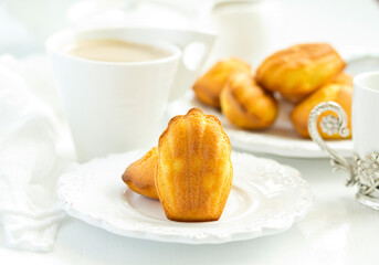 Sticker - Madeleine french cookies with caramel. selective focus.