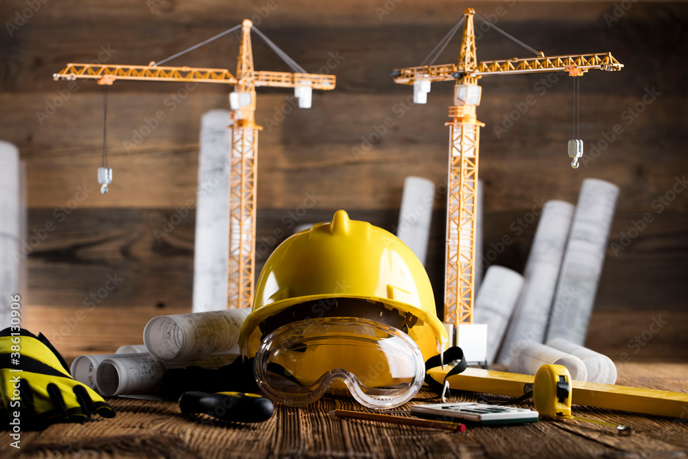 Contractor Yellow Contractor office. Tool kit of the contractor: yellow hardhat, libella ...