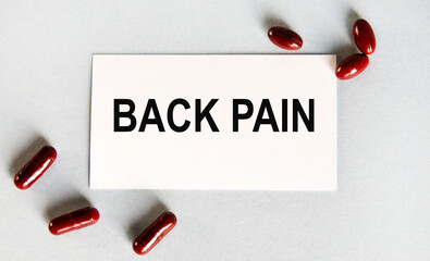 Back PAIN is written on the letter tablet. medical concept.