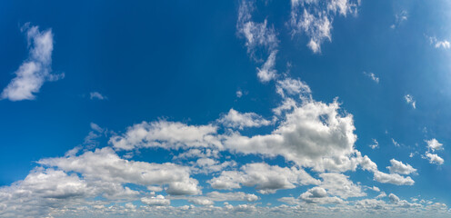Wall Mural - fantastic clouds against blue sky, panorama