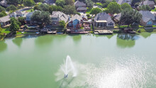 Aerial View Luxury Waterfront Houses With Lake Fountain In Sunny Day Near Dallas, Texas, USA