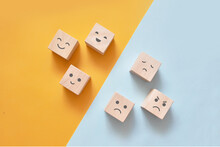 Image Of Different Emotions On Wooden Cubes.