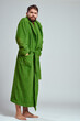 © SHOTPRIME STUDIO - emotional man in a green robe on a light background in full growth fun emotions model