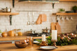 Rustic kitchen details for Christmas. Rustic kitchen table setting and decor for New Year close-up and copy space.