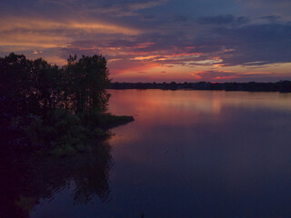 Dramatic sunset over Thousand Island river in Lava