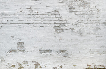 White brick wall background Weathered plaster