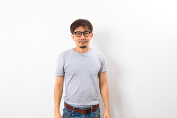 Middle age asian man in grey T-shirt on white background.