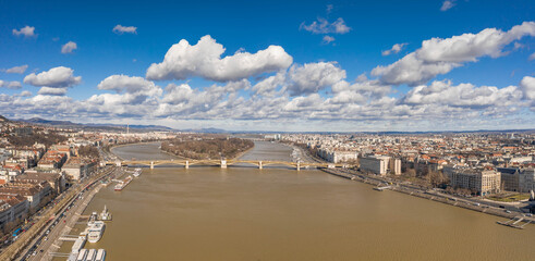 Wall Mural - Aerial panoramic view of Hungarian Parliament in shadow by danube in Budapest morning