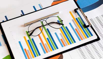Poster - Business document Financial chart and graph with pen and glasses